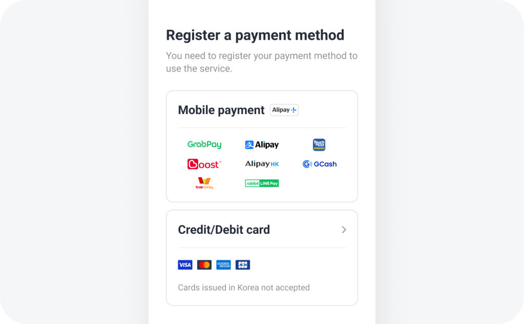 K.ride app payment method registration screen with mobile payment and international credit card options.